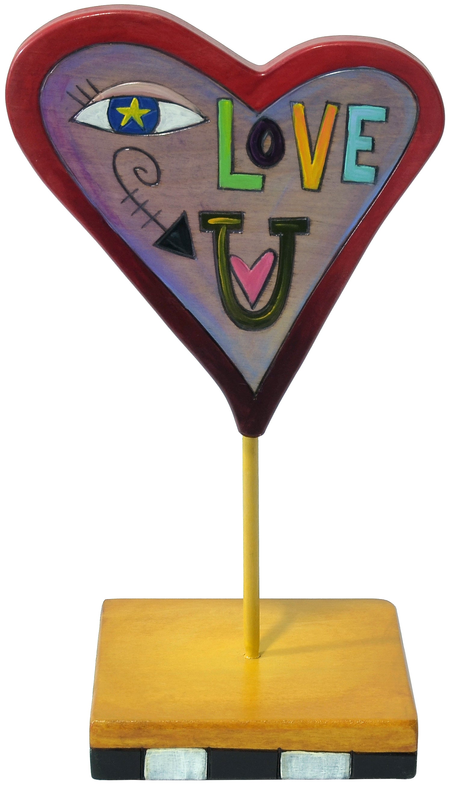Heart-shaped sculpture with eye and 'LOVE' text on a yellow stand
