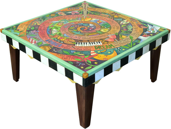 Colorful coffee table with intricate design and text on a white background