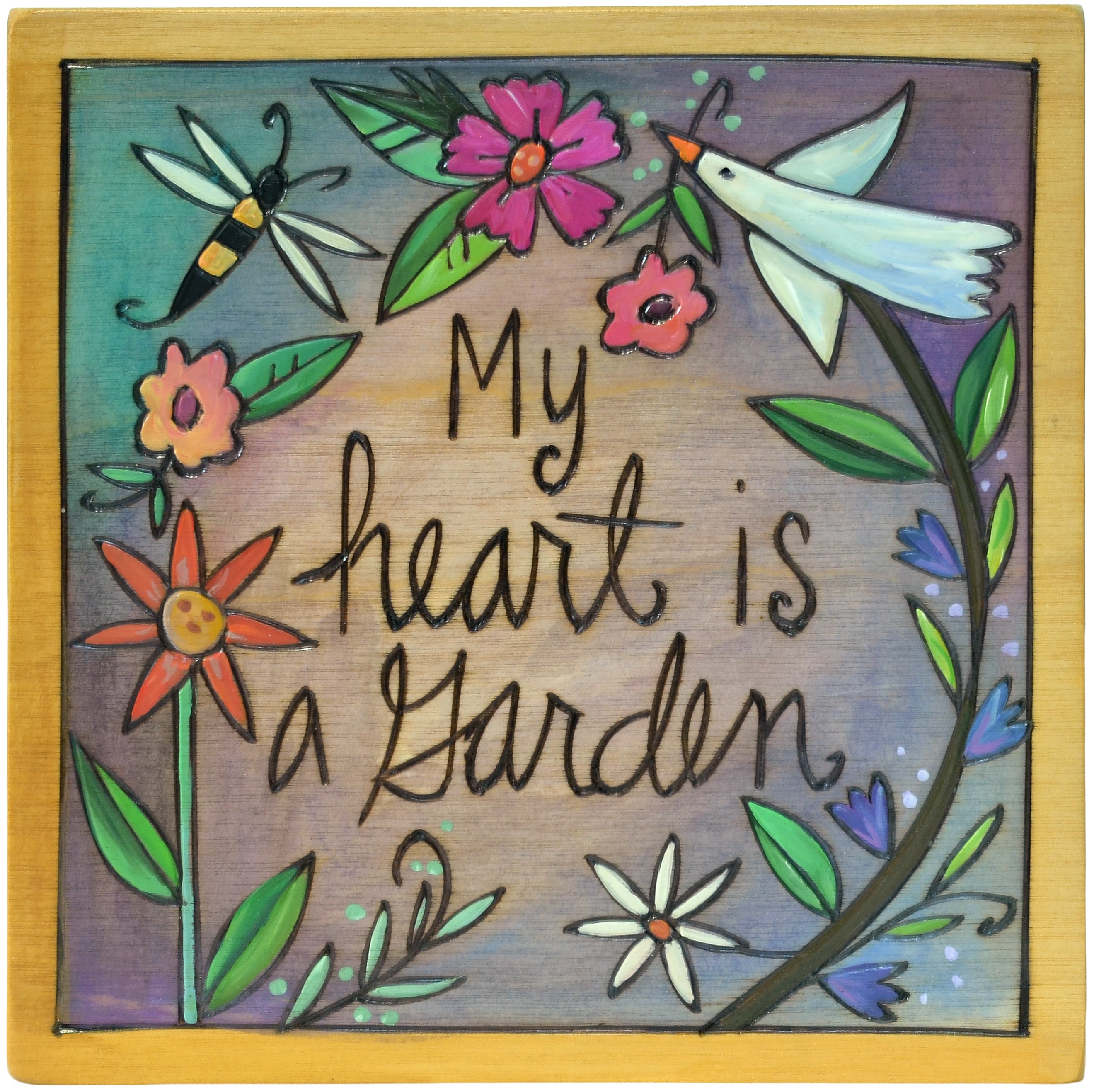 Decorative plaque with flowers, insects, and 'My heart is a garden' text on a wooden background.