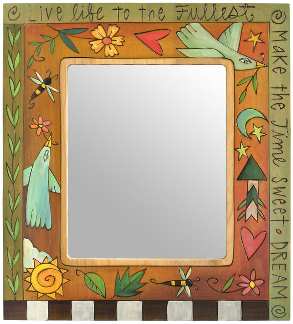 Hand painted picture frame with a green border, and orange interior filled with floating icons. Including doves, bees, hearts, flowers, and a sun and moon.