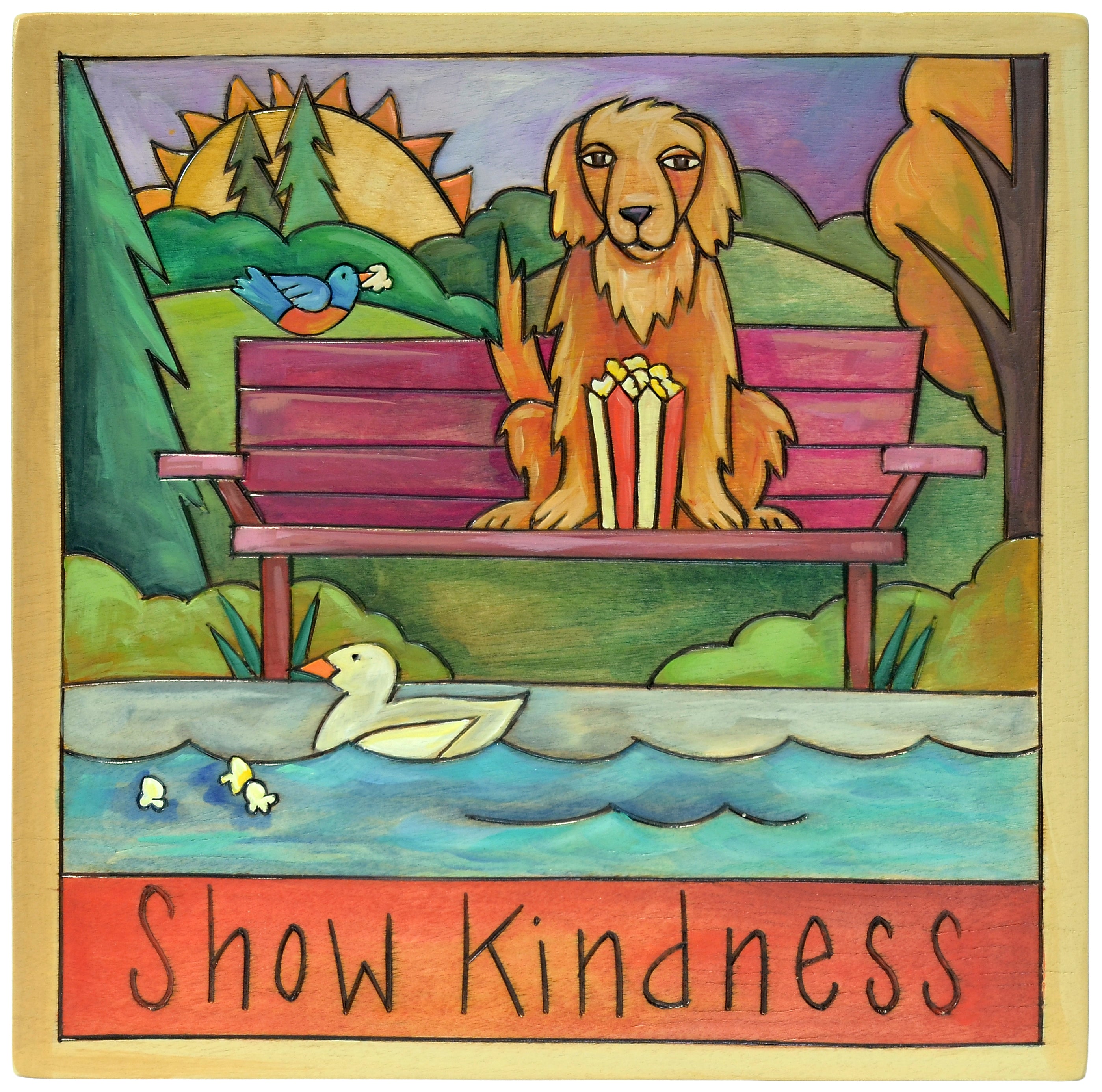 Colorful artwork of Labrador retriever dog feeding ducks with popcorn on a bench by a lake, with 'Show Kindness' text at the bottom.