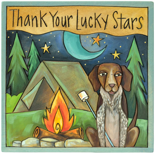 Illustration of a German Shorthair Pointer dog by a campfire with trees and stars in the background, featuring the text 'Thank Your Lucky Stars'.