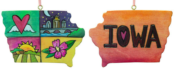 Decorative ornament shaped like the state of Iowa with a farm, heart with wings, wild rose, and Des Moines skyline