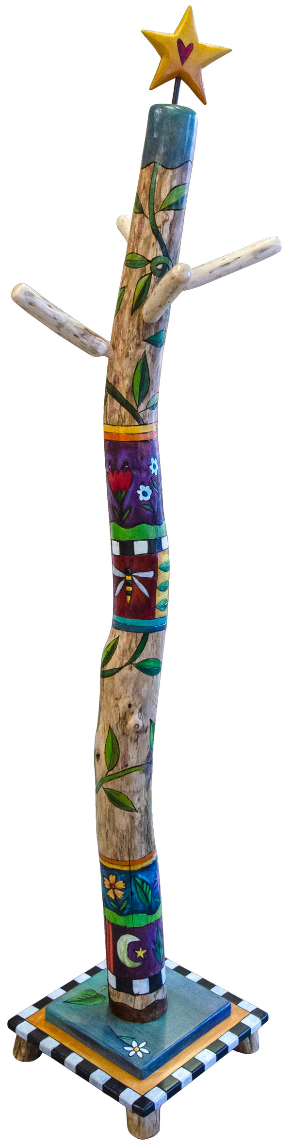 Colorful hand-painted log coat tree with star on top against a white background