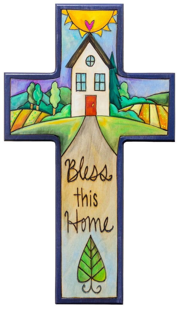 Decorative cross with a house illustration and 'Bless this Home' text on a white background