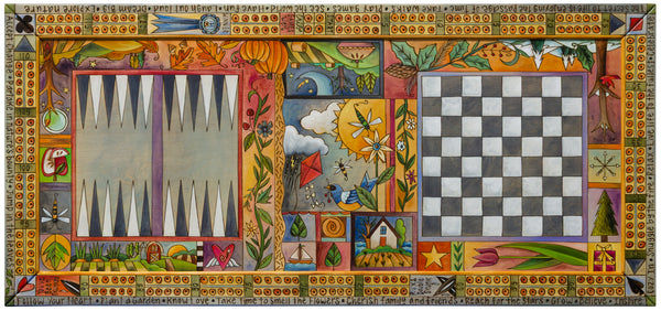 A highly detailed, colorful folk art style game table. The game table is decorated with intricate illustrations of autumn landscapes, including pumpkins, corn, a sunset, a bird, and a small house, framed by a decorative border.