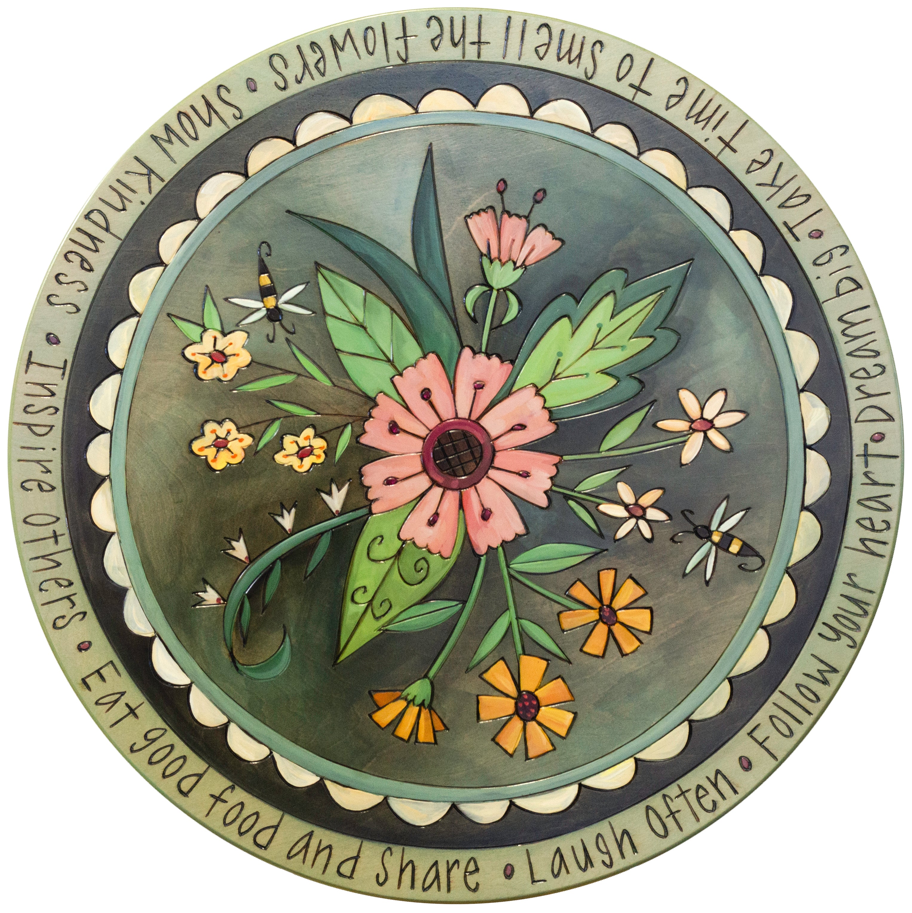 Decorative lazy susan with floral design and text on a white background