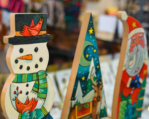 Snowman, reindeer, and Santa wood Christmas scuptures 