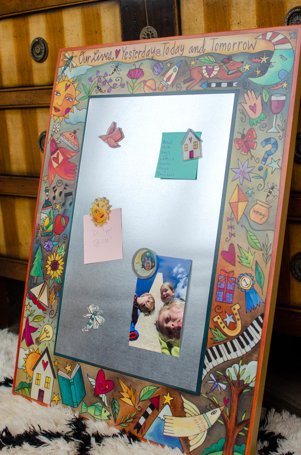Decorative magnetic frame with colorful designs and a mirror surface.