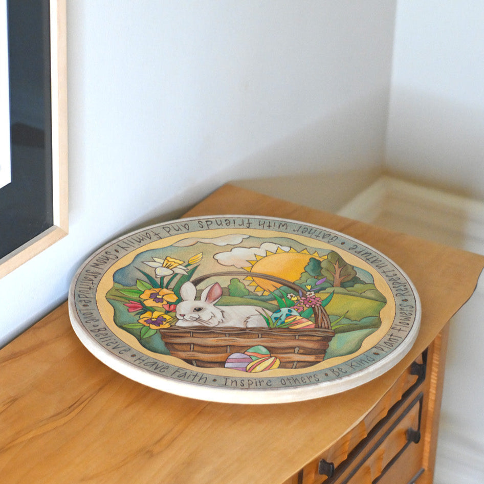 Easter themed lazy susan on buffet in dining room