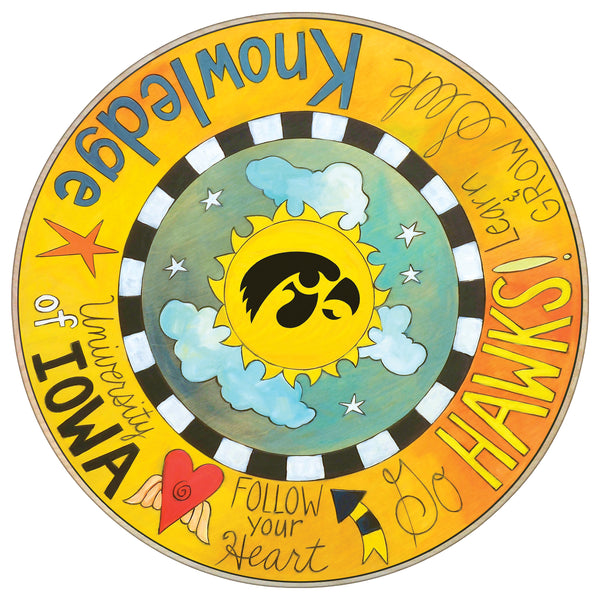 Decorative lazy susan with sun, clouds, and text about the University of Iowa Hawks
