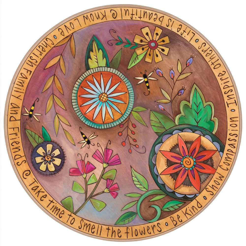 Brightly colored contemporary floral design on a decorative wood lazy susan