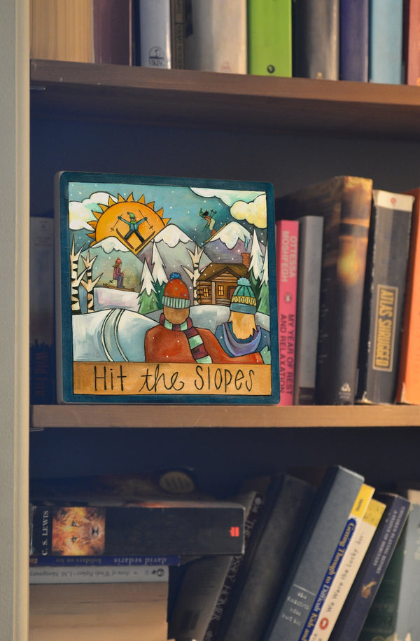 Snowy ski 'Snow Bunnies' design on a bookshelf