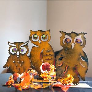 Boo Owl Sculpture – Charming woodland owl adds a unique touch to your home's autumn display shown with other owls in a home's display