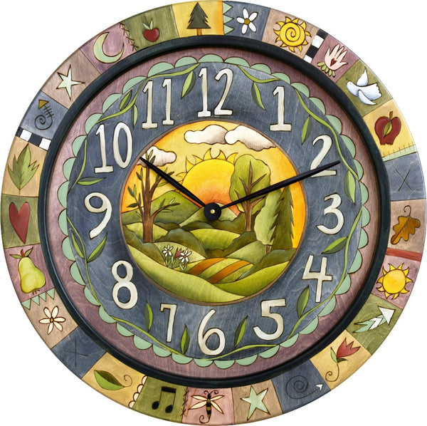 Sticks handmade 36"D wall clock with sunrise landscape and colorful life icons