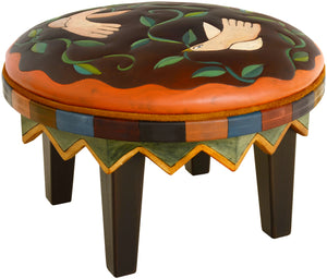 Round Ottoman –  Handsome ottoman in a classic palette with birds and twisting vines artwork main view