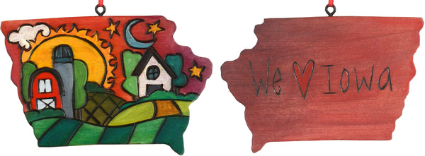 Red-hued "We love Iowa" ornament with a farm landscape motif