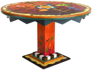 Sticks handmade dining table with vibrant folk art imagery