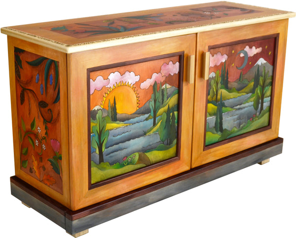 Medium Buffet –  Beautiful two door buffet featuring a lush landscape painting, sun and moon motif, and interior shelving main view