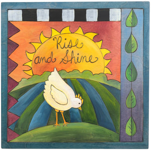 Sticks handmade wall plaque with "Rise and Shine" quote and chicken at sunrise landscape
