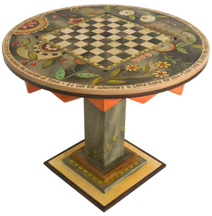 Flip-Top Game Table –  "Go Out for Adventure/Come Home for Love" flip-top game table with checkerboard surrounded by beautiful floral motif