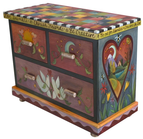 Small Dresser –  Beautiful dresser painted in rich hues with colorful block patterning and symbolic imagery