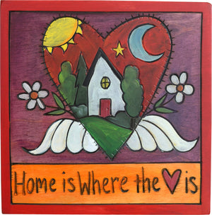 Sticks handmade wall plaque with "Home is Where the Heart is" quote and heart with wings motif