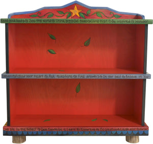 Short Bookcase –  Colorful bookcase with symbolic block icons painted in rich hues 