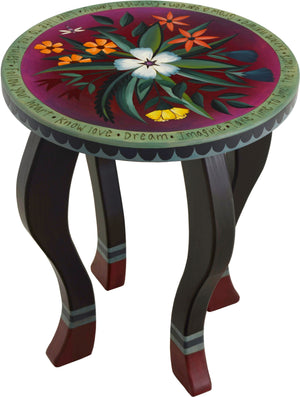 Round End Table –  Handsome end table with rich hues and floral motifs