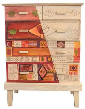 Tall Dresser –  Beautiful patchwork themed dresser done in warm tones and whitewash accents front view