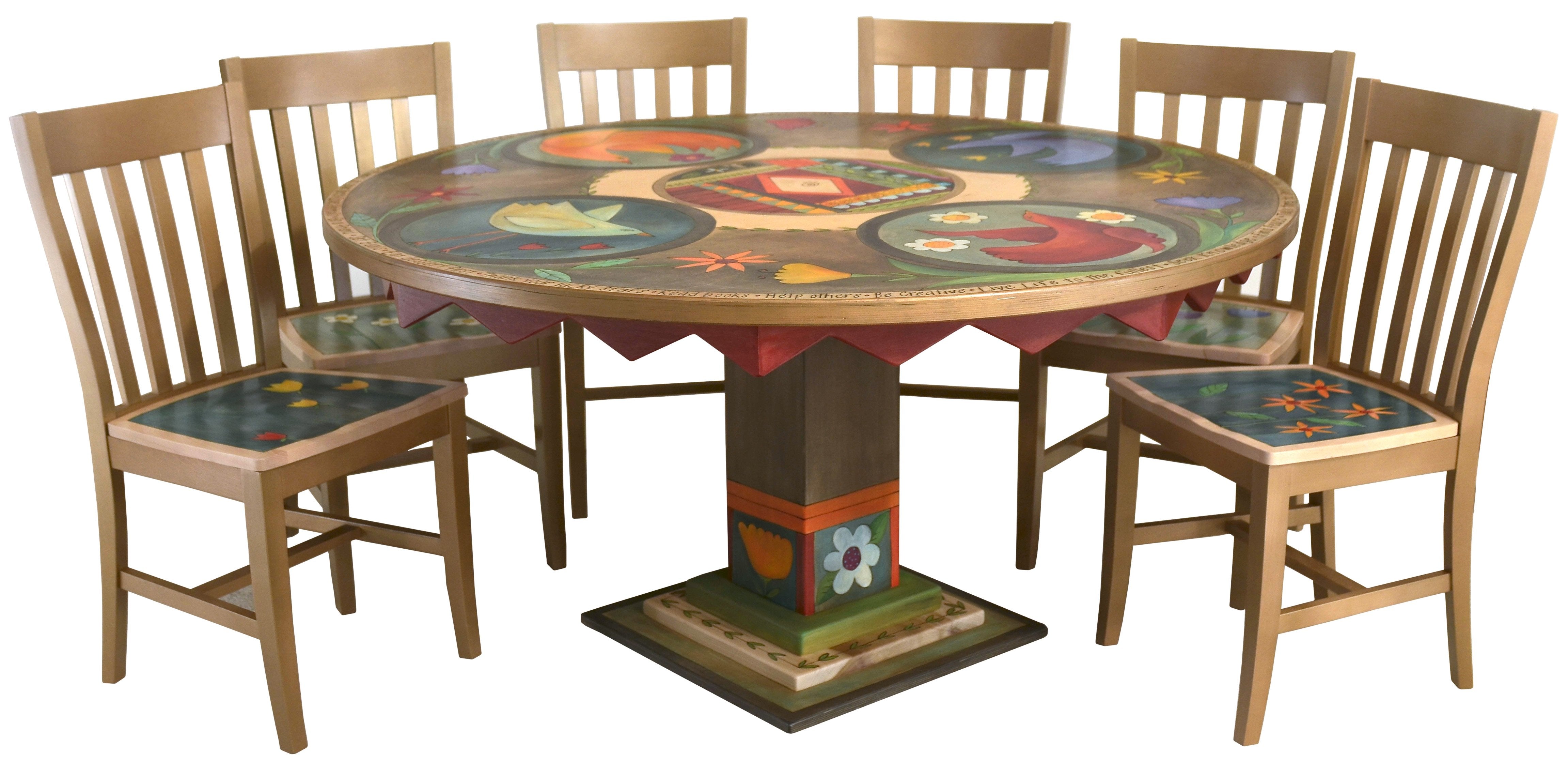 Sticks handmade dining table with colorful folk art imagery and matching chairs