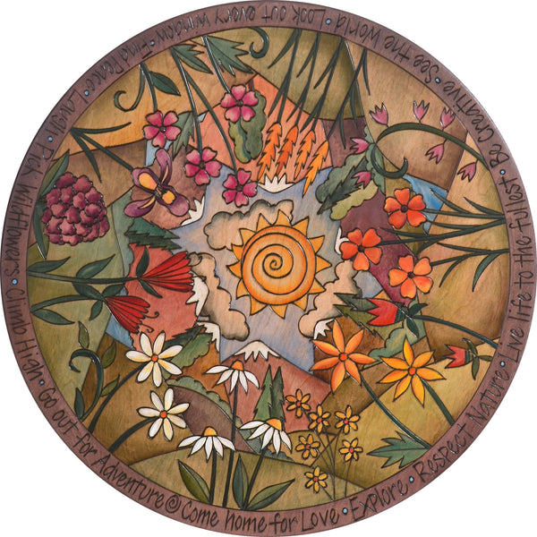 Sticks Handmade 24"D lazy susan with mountain landscape and wildflowers