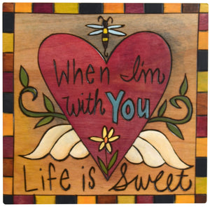 7"x7" Plaque –  "When I'm with you life is sweet" heart with wings motif in warm, classic tones