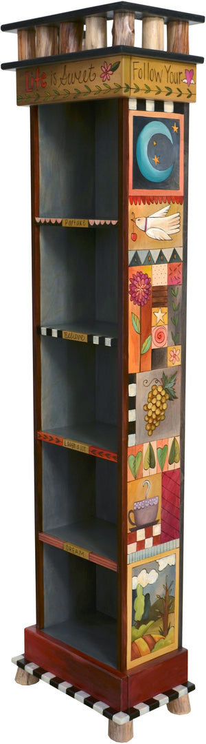 Tall Bookcase –  Handsome tall bookcase with dark interior and colorful block icons on the exterior walls