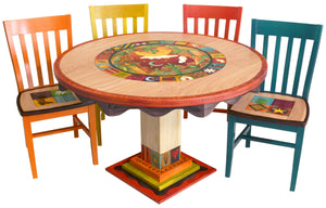 Sticks handmade dining table with colorful folk art imagery with matching chairs