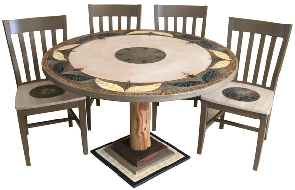 Sticks handmade dining table with elegant floral design and matching chairs