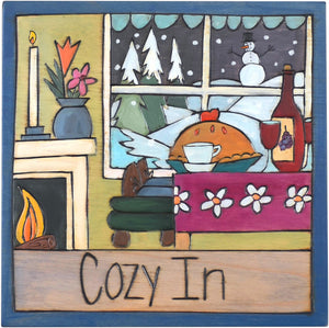 Sticks handmade wall plaque with "Cozy In" quote and winter holiday scene with fireplace, wine, pie and a picture window