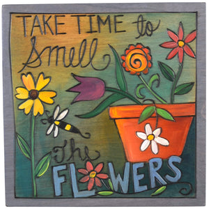 Sticks handmade wall plaque with "Take Time to Smell the Flowers" quote and floral garden theme