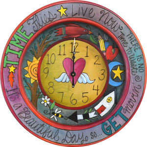 14" Round Wall Clock –  Colorful round wall clock with a heart with wings at its center