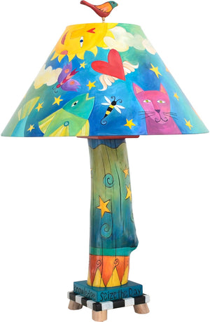 Log Table Lamp –  Bright and colorful table lamp with floating icons and symbols