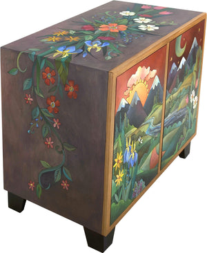 Media Buffet –  Gorgeous media cabinet featuring rolling mountains and foothills landscape with sun and moon and wildflowers