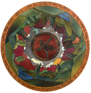 Sticks Handmade 24"D lazy susan with rolling mountains and lake landscapes