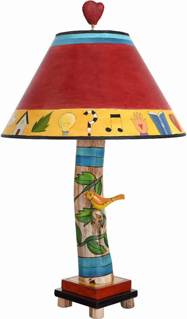 Log Table Lamp –  Colorful and vibrant table lamp with vine motifs and bird element