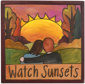 Sticks handmade wall plaque with "Watch Sunsets" quote and couple at sunset in the fall imagery