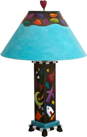 Box Table Lamp –  Contemporary and colorful table lamp with floating symbolic icons