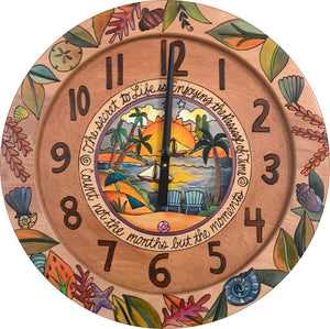 24" Round Wall Clock –  Beautiful tropical wall clock with an ocean scene in its center and shells, kelp, and coral along the outer edge
