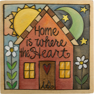 Sticks handmade wall plaque with "Home is where the heart is" quote and cheery home imagery