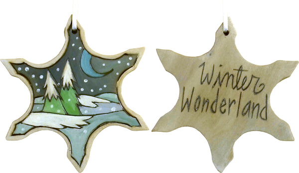 Snowflake Ornament –  "Winter Wonderland" snowflake ornament with moon over snow-covered pine trees motif