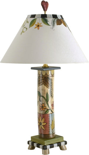 Log Table Lamp –  Elegant table lamp with flora and vine motifs