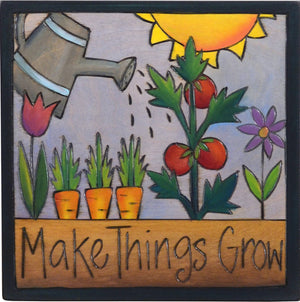 Sticks handmade wall plaque with "Make Things Grow" quote and blooming flower and vegetable garden